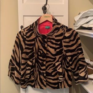 Tiger stripe swing top. Size M runs small.